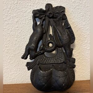 Vintage Black Cast Iron match holder, featuring a rabbit and a fowl.